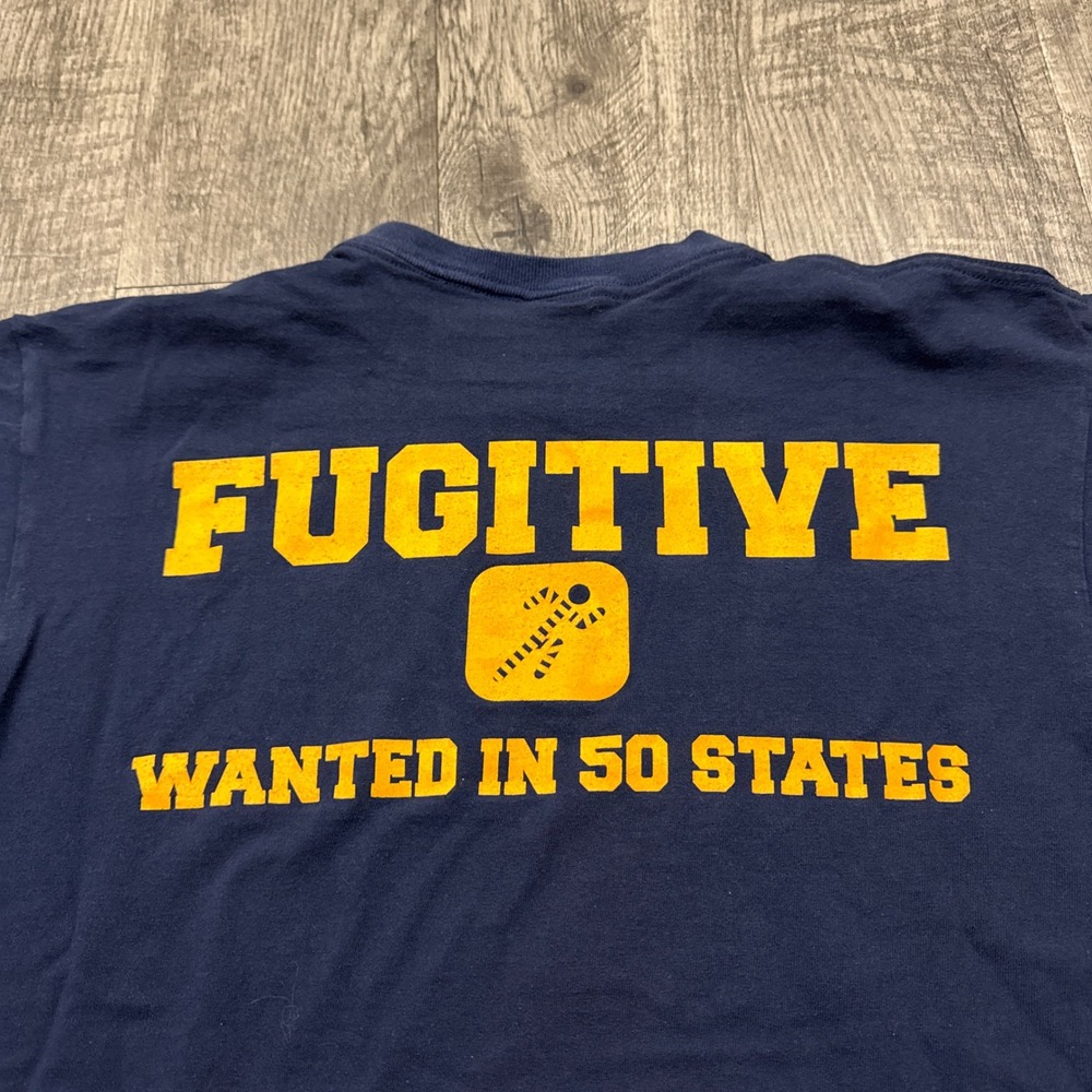 Vintage Sherry's Best Fugitive Wanted in 50 States T Shirt